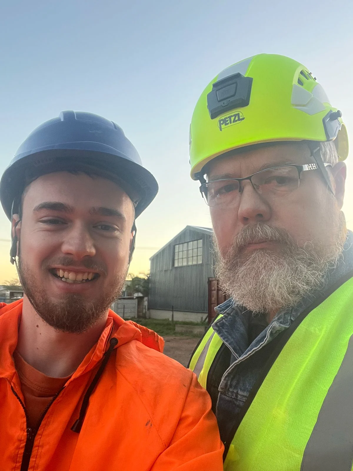 André Eksteen and son on site in safety gear